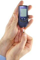 Man Performs Glucose Blood Test