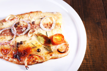 Dish of Pangasius fillet with spices and vegetables