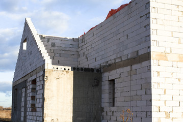 Construction of the new white brick house
