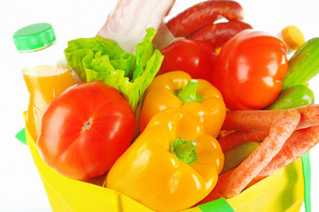 Shopping bag with set of products, closeup