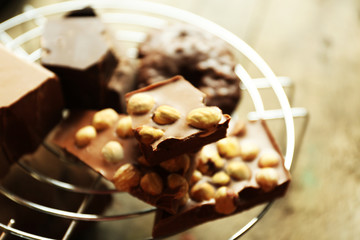 Still life with set of chocolate with nuts, closeup