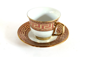 Elegant Antique china tea cup and saucer on white background