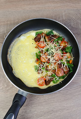Omelette with vegetables and cheese