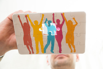 Person Hand With Puzzle