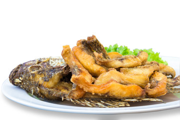 fried fish in dish  on isolated  white background