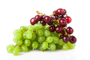 Black and white grapes isolated on white background