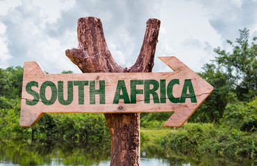 South Africa wooden sign with countryside background