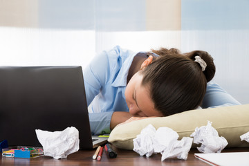 Businesswoman Sleeping At Desk