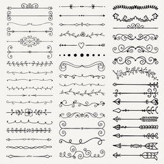 Obraz premium Vector Black Hand Drawn Dividers, Arrows, Swirls