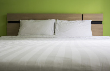 Obraz premium Bed in the bedroom