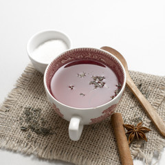 tea in vintage cup on wooden table