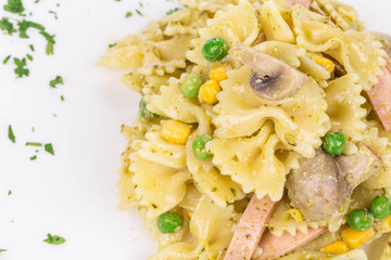 Pasta farfalle with ham and mushrooms