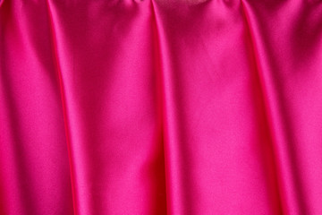 Pink silk drapery.