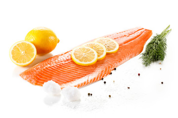 Raw salmon fillet on white background