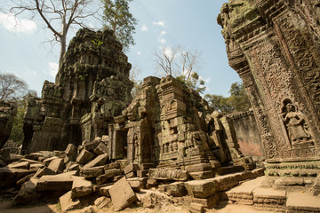 Ta Prohm ruins with carved apsaras and tower