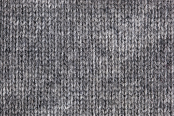 Gray knitted horizontal textured background