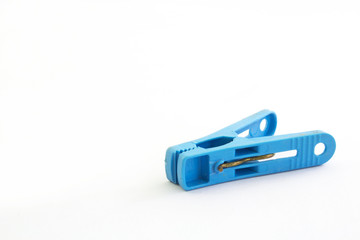 Blue Clothespin on white background