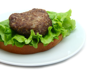 sandwich with cutlet and leaf lettuce