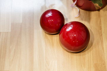 Two red decoration balls