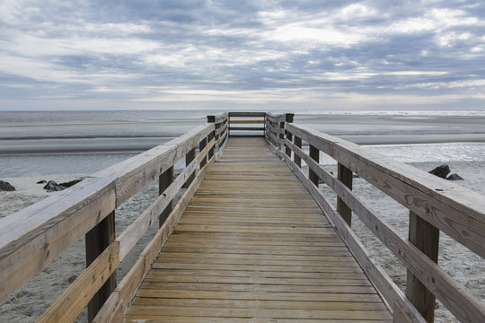 Wooden pier over beach