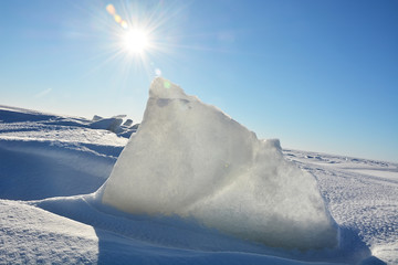 Sunny polar landscape- frozen sea at the sunny day