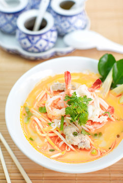 Spicy seafood noodle soup with coconut milk