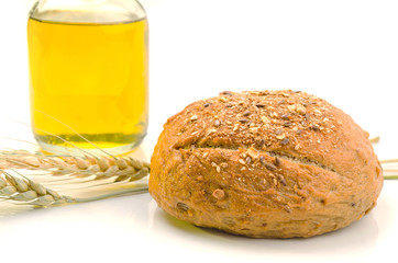 fresh bread and wheat on white