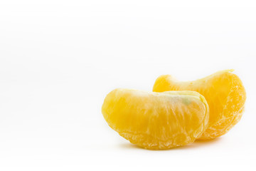 pieces of orange on white background, text caption