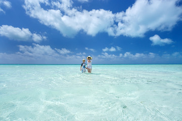 Woman, boy and Caribbean sea