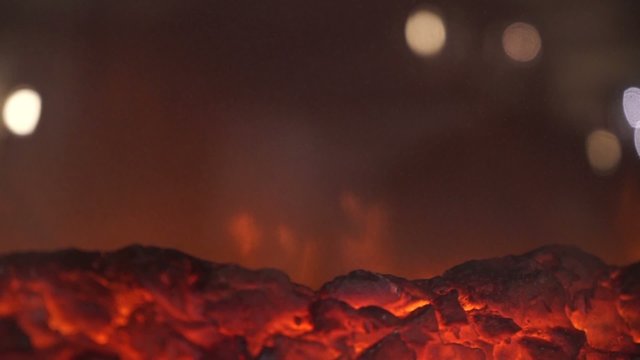 background artificial fireplace in motion