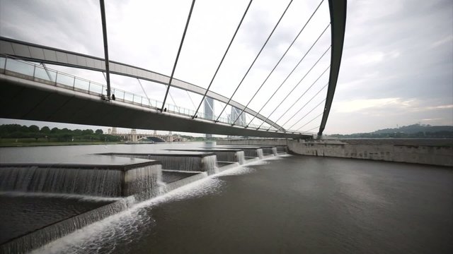 Water Flow At Putrajaya Dam Below Pedestrian Bridge