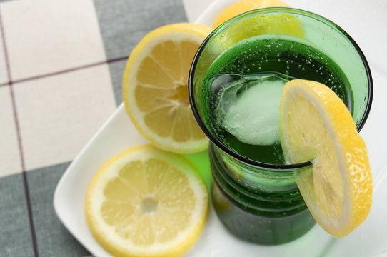 Green Glass with Lemons and Angle View
