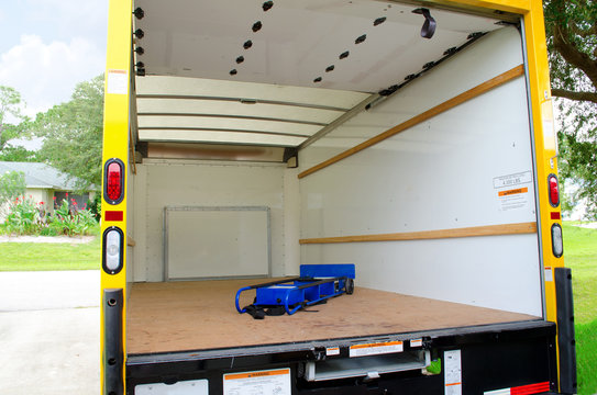 Empty Moving Truck With Dolly In Back