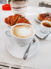 Croissant and a cup of coffee