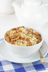 Oatmeal flakes with nuts in bowl
