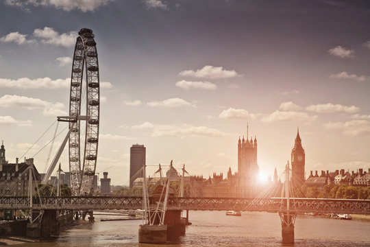 Sunset over bridge and London Eye