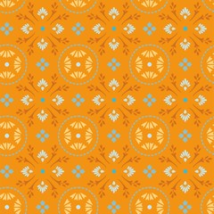 The pattern of twigs and flowers orange with blue.