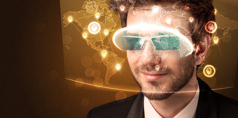 Young man looking at futuristic social network map