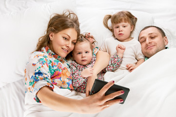 Family taking picture of themselves