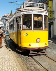 Naklejka na ściany i meble Lisbon tram in Alfama district, Lisbon.