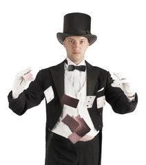 magician holding playing cards