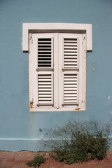 Traditional tropical window with shutters