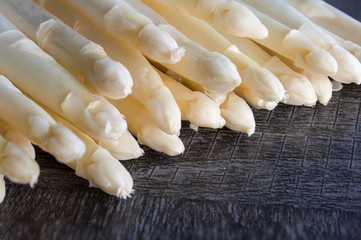 white asparagus on a black background