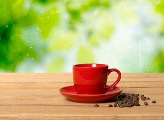 Americano. Cup of fresh coffee with coffee beans on wooden table