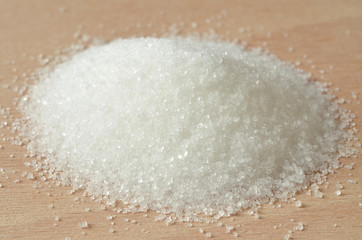 Heap of white granulated crystal sugar