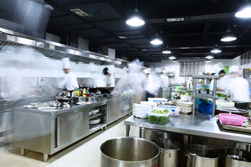 modern kitchen and busy chefs - 82169239