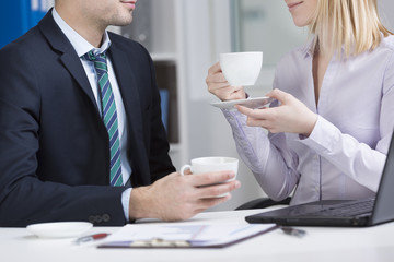 Businesspeople drinking coffee