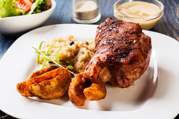 Pork knuckle with fried sauerkraut