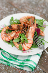Grilled shrimps served outdoor in winter