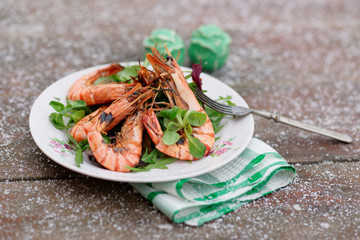 Grilled shrimps served outdoor in winter